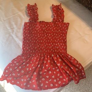 Smocked babydoll tank top with ruffle sleeves